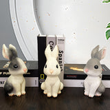 Creative Easter Rabbit Piggy Bank Cute Cartoon Ornaments for Student Storage Resin Piggy Bank for Home Decoration.